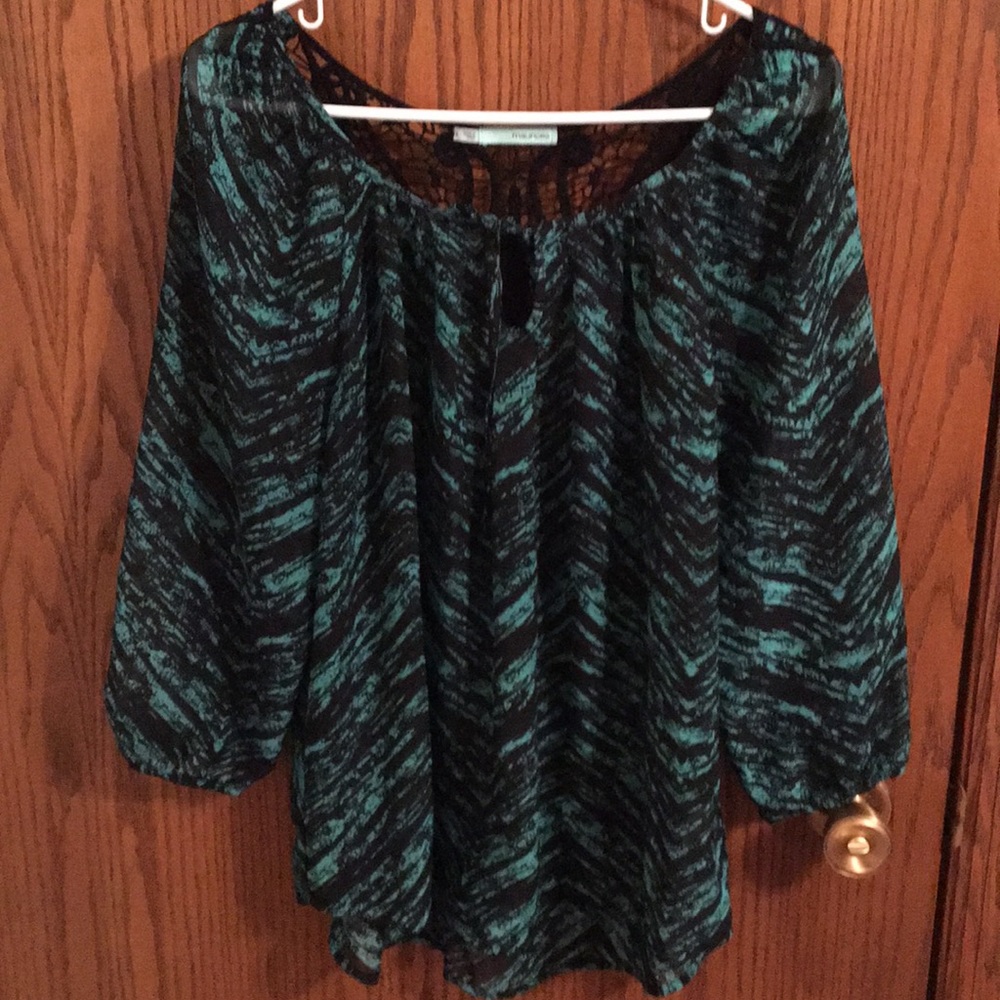 Maurice’s turquoise blouse